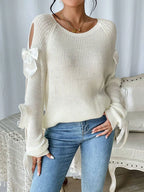 Modischer Strickpullover mit Schleifendetails, durchbrochenen Raglanärmeln und Rundhalsausschnitt im minimalistischen Stil