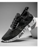 Sommer Herren Schwarze Hohl-Mesh-Sneaker Mode Atmungsaktive Leichte Freizeit-Gehschuhe Bedruckte Sohle Outdoor-Sport-Schuhe