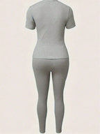 Zweiteiliges Set für Damen mit Paris-Druck, lässiges kurzärmliges T-Shirt mit Rundhalsausschnitt und enge Hose, langes Hosen-Set, Kollektion 2026