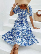 Elegantes Maxikleid mit Blumenmuster und Kragen – Damenmode im eleganten Stil