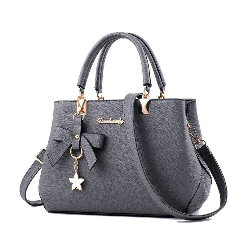 Neue koreanische Version trendige Herbst- und Winter-Schleifen-Damenhandtasche tragbare Umhängetasche Killer Bag Muttertasche großes Fassungsvermögen