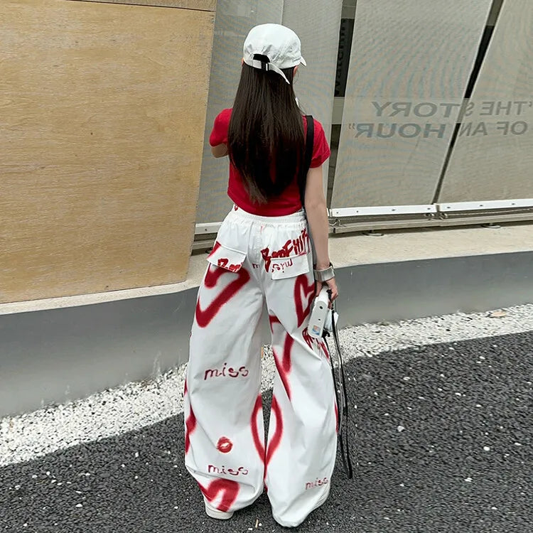 2026 Sommer Frühling Teenager Trainingsanzug Mädchen Kleidung Herz Graffiti 1 T-Shirt Oberteil oder lange weite Beinhose Kind 4 6 7 8 9 10 12 14 Jahre