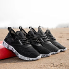 Sommer Herren Schwarze Hohl-Mesh-Sneaker Mode Atmungsaktive Leichte Freizeit-Gehschuhe Bedruckte Sohle Outdoor-Sport-Schuhe