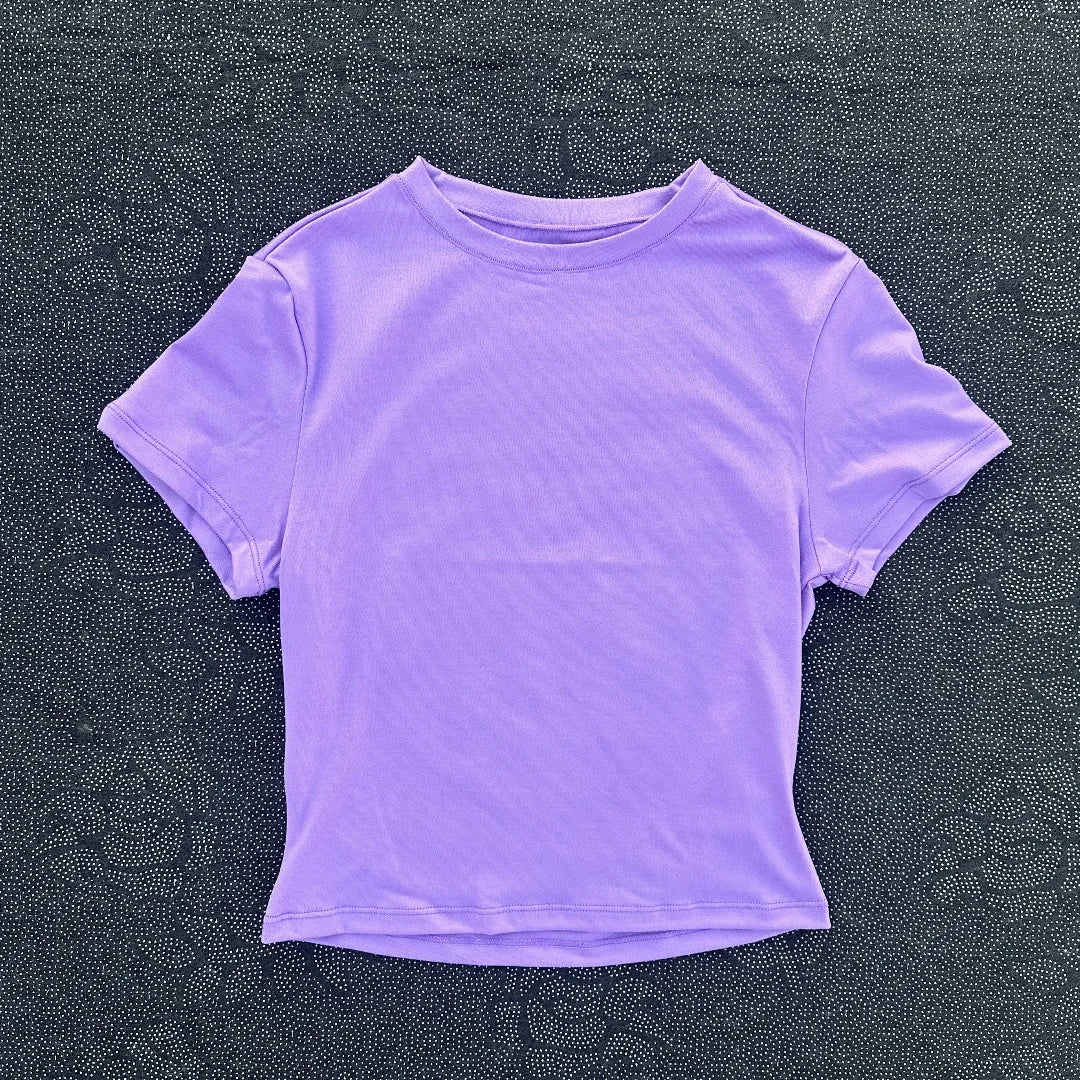 Solid color women's soft breathable yoga short-sleeved comprehensive training tight T-shirt with exposed belly button fitness sh