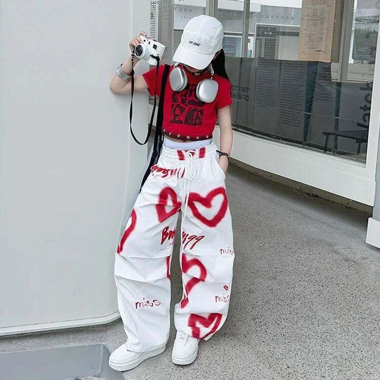2026 Sommer Frühling Teenager Trainingsanzug Mädchen Kleidung Herz Graffiti 1 T-Shirt Oberteil oder lange weite Beinhose Kind 4 6 7 8 9 10 12 14 Jahre