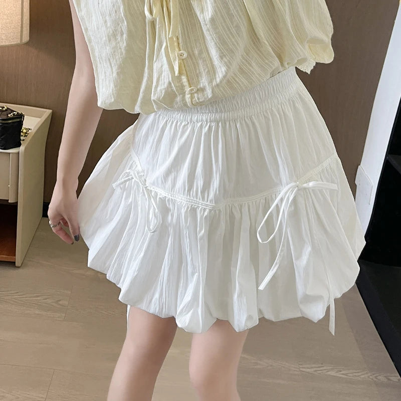 Süße Schleifen Plissierte Flauschige Röcke für Damen Sommer Koreanischer Stil Elastische Taille Laternenrock Damen Lockerer Weißer A-Linien Minirock