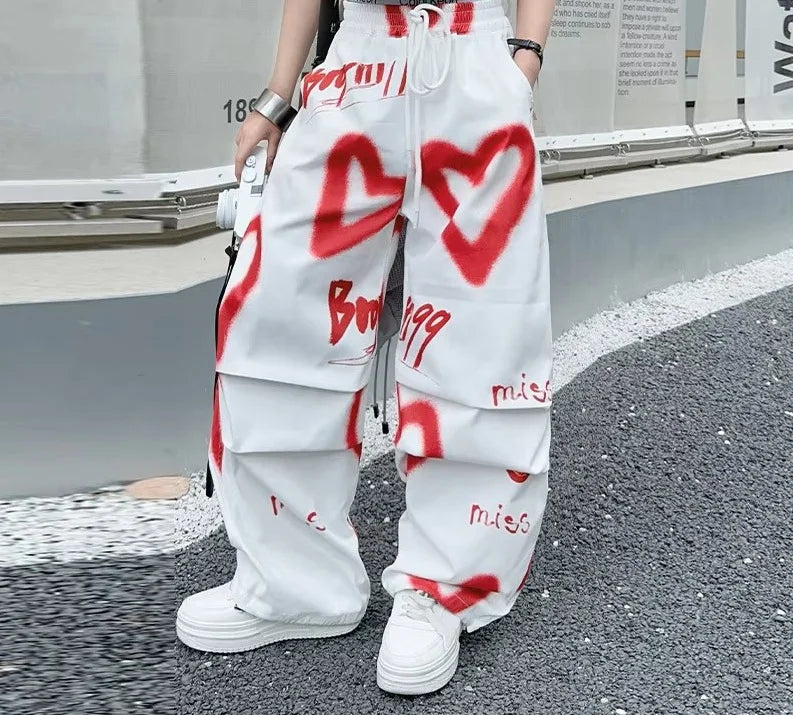 2026 Sommer Frühling Teenager Trainingsanzug Mädchen Kleidung Herz Graffiti 1 T-Shirt Oberteil oder lange weite Beinhose Kind 4 6 7 8 9 10 12 14 Jahre