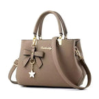 Neue koreanische Version trendige Herbst- und Winter-Schleifen-Damenhandtasche tragbare Umhängetasche Killer Bag Muttertasche großes Fassungsvermögen