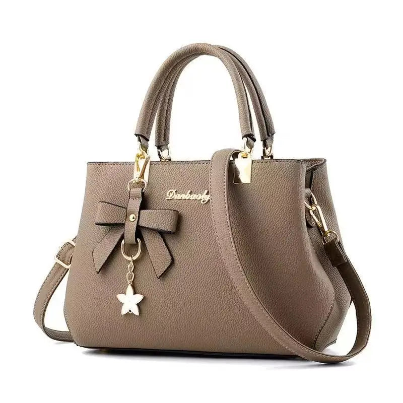 Neue koreanische Version trendige Herbst- und Winter-Schleifen-Damenhandtasche tragbare Umhängetasche Killer Bag Muttertasche großes Fassungsvermögen