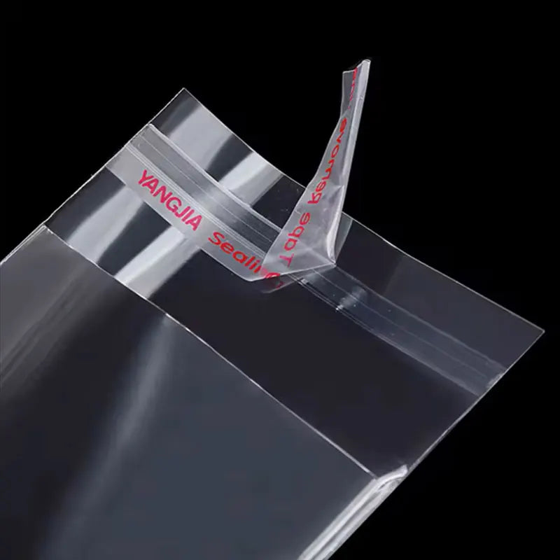 100 Stück OPP selbstklebende transparente Plastiktüte Kleidung Schmuck Verpackung Selbstklebende Keks-Bonbon-Verpackung Cellophan-Beutel