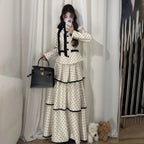 Koreanische Mode Elegantes beiges Polka-Dot-Damen-Set Langarm-Ein-Knopf-Oberteil Hohe Taille A-Linie Rüschen-Stufenrock 2-teilig