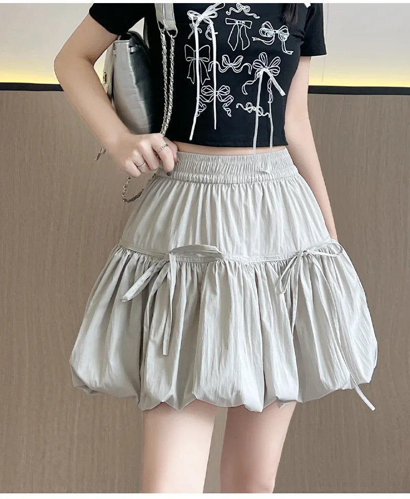 Süße Schleifen Plissierte Flauschige Röcke für Damen Sommer Koreanischer Stil Elastische Taille Laternenrock Damen Lockerer Weißer A-Linien Minirock