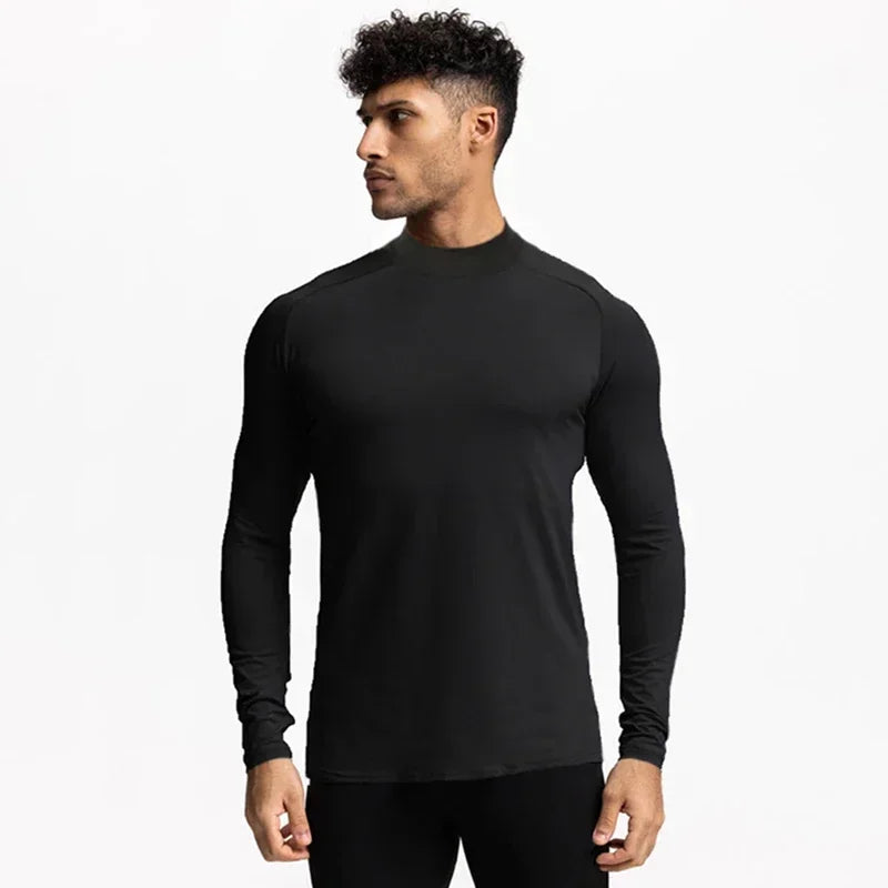 Einfarbige, eng anliegende, schweißabsorbierende, elastische Shirts Fitnessstudio Bodybuilding Fitness Rollkragen-T-Shirts Herren Langarm Schnelltrocknend Herbstkleidung
