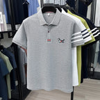 Luxusmarke Herren hochwertiges Kurzarm-Poloshirt Revers Stickerei Welpe Manschette Streifen T-Shirt Business Freizeit Herrenbekleidung