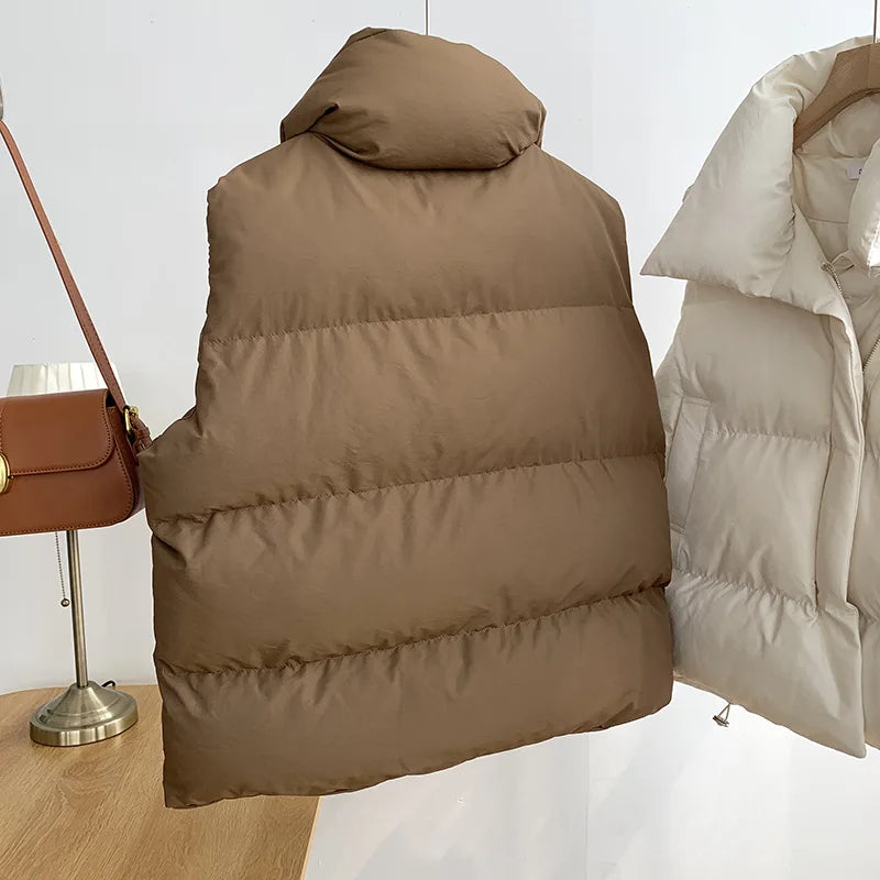 Damenmode Herbst Neu 2024 Stehkragen Elegante Daunenmäntel Warme Oberbekleidung Freizeitgürtel Ärmellose Winter Damenwesten Jacken