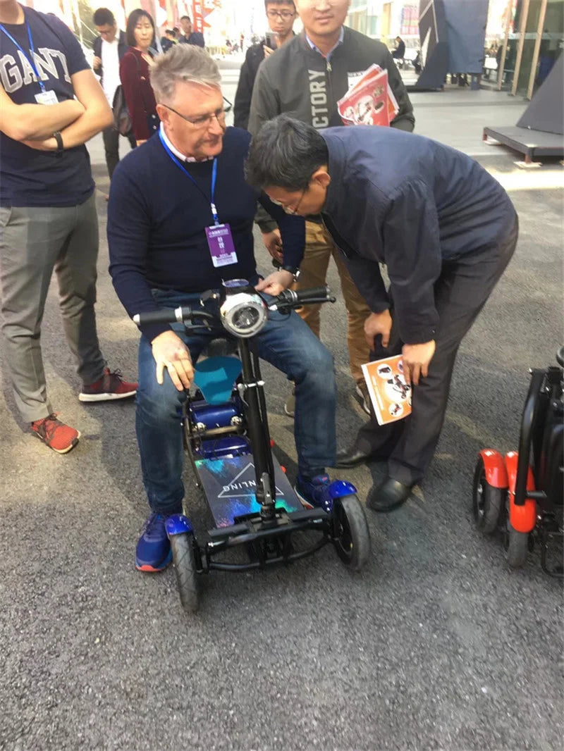Elektrisches Vierrad-Skateboard Tragbare Elektroroller 10 Zoll 36V klappbarer Elektroroller für Behinderte und Senioren