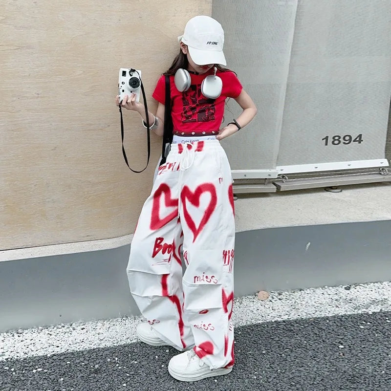 2026 Sommer Frühling Teenager Trainingsanzug Mädchen Kleidung Herz Graffiti 1 T-Shirt Oberteil oder lange weite Beinhose Kind 4 6 7 8 9 10 12 14 Jahre