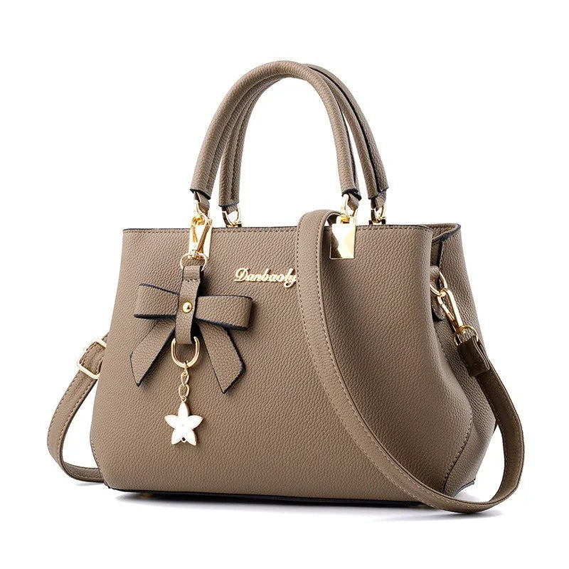 Neue koreanische Version trendige Herbst- und Winter-Schleifen-Damenhandtasche tragbare Umhängetasche Killer Bag Muttertasche großes Fassungsvermögen