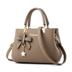 Neue koreanische Version trendige Herbst- und Winter-Schleifen-Damenhandtasche tragbare Umhängetasche Killer Bag Muttertasche großes Fassungsvermögen