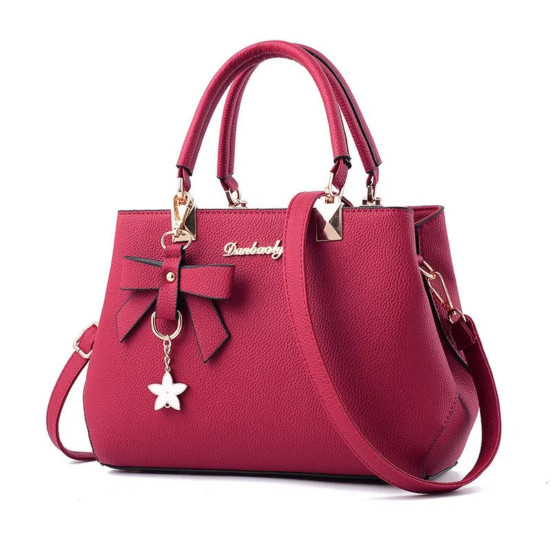 Neue koreanische Version trendige Herbst- und Winter-Schleifen-Damenhandtasche tragbare Umhängetasche Killer Bag Muttertasche großes Fassungsvermögen