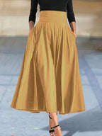 Neu eingetroffen: Kleider, einfarbige A-Linien-Röcke für Damen, Bekleidung, langer Rock mit hoher elastischer Taille für Damen mit Schleife, elegante Damenröcke